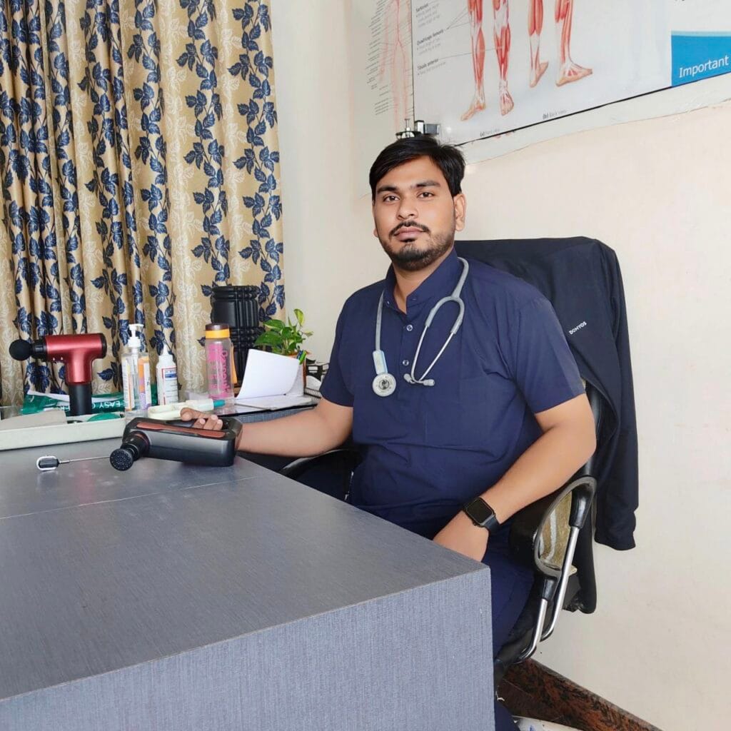 Dr. Harish Kumar using physiotherapy tool with stethoscope in clinic at PhysioCare247, Phulera