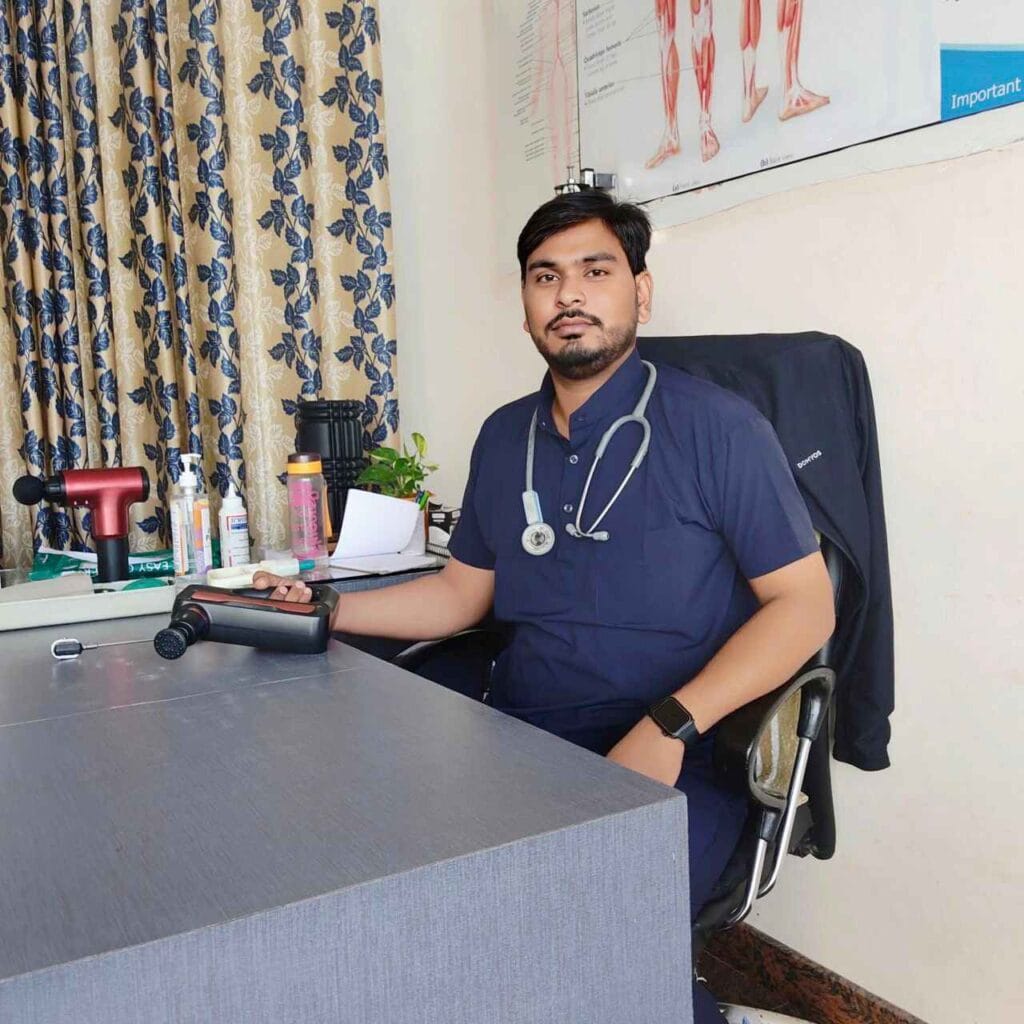 Dr. Harish Kumar using physiotherapy tool with stethoscope in clinic at PhysioCare247, Phulera